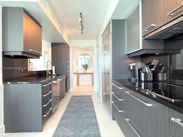 1331 Brickell Bay Dr Unit 2002, Miami, FL 33131 - kitchen featuring a sink, dark countertops, appliances with stainless steel finishes, and gray cabinets