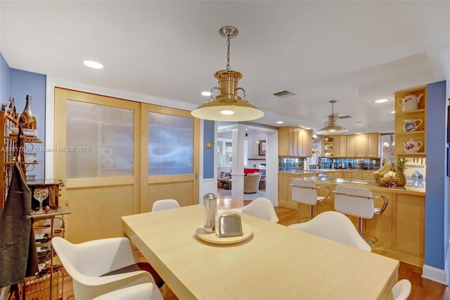 11537 SW 34th Ln, Miami, FL 33165 - dining area with light wood-type flooring and recessed lighting