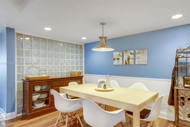 11537 SW 34th Ln, Miami, FL 33165 - dining space featuring light wood finished floors, wainscoting, and recessed lighting