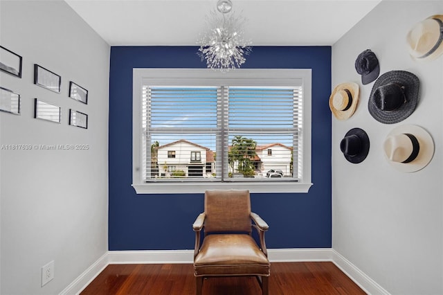 11537 SW 34th Ln, Miami, FL 33165 - sitting room featuring a chandelier, healthy amount of natural light, wood finished floors, and baseboards