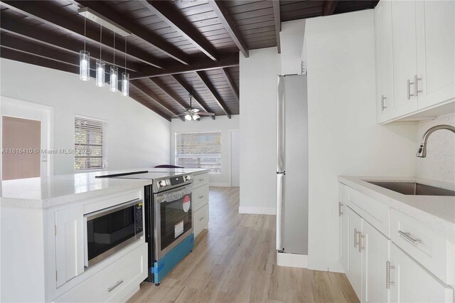 1025 SW 22nd Ter, Fort Lauderdale, FL 33312 - kitchen featuring appliances with stainless steel finishes, light wood finished floors, wooden ceiling, white cabinetry, and decorative light fixtures