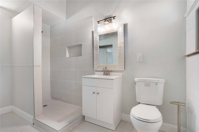 1025 SW 22nd Ter, Fort Lauderdale, FL 33312 - bathroom featuring vanity, a tile shower, and tile patterned flooring