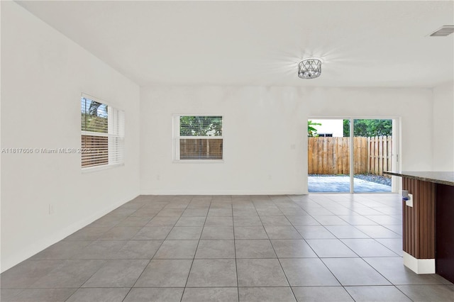 279 SE 31st Ter, Homestead, FL 33033 - spare room featuring plenty of natural light and light tile patterned floors
