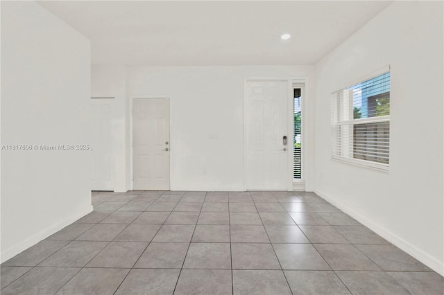279 SE 31st Ter, Homestead, FL 33033 - tiled spare room with baseboards