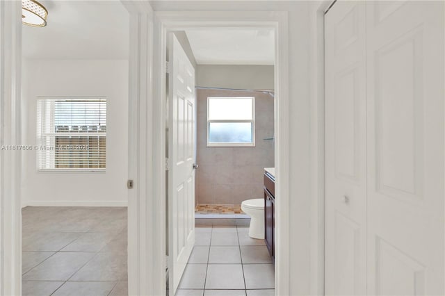 279 SE 31st Ter, Homestead, FL 33033 - full bathroom featuring tile patterned flooring, a tile shower, vanity, and a closet