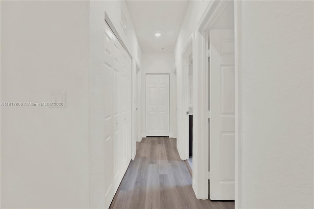 279 SE 31st Ter, Homestead, FL 33033 - hallway with wood finished floors and recessed lighting