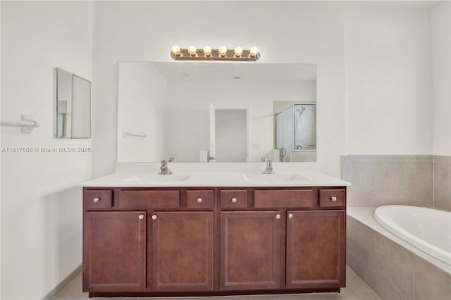 279 SE 31st Ter, Homestead, FL 33033 - bathroom with a bath, double vanity, and a shower stall