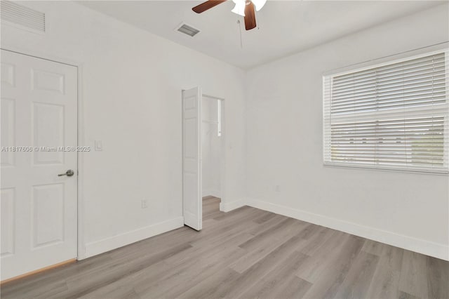 279 SE 31st Ter, Homestead, FL 33033 - unfurnished bedroom with light wood-style flooring and a ceiling fan
