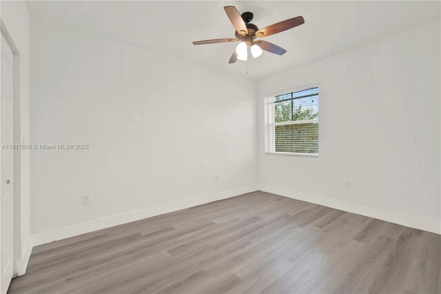 279 SE 31st Ter, Homestead, FL 33033 - unfurnished room with wood finished floors and a ceiling fan