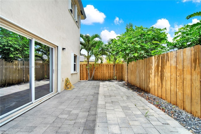 279 SE 31st Ter, Homestead, FL 33033 - fenced backyard with a patio area