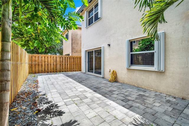 279 SE 31st Ter, Homestead, FL 33033 - fenced backyard featuring a patio
