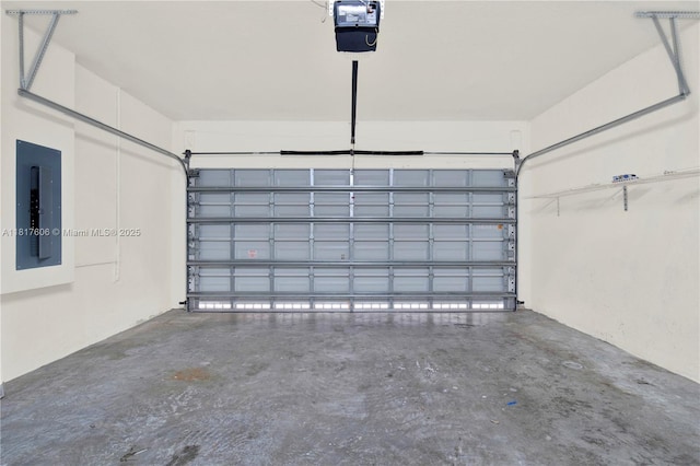 279 SE 31st Ter, Homestead, FL 33033 - garage featuring electric panel and a garage door opener
