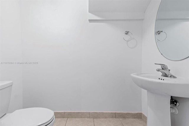 2652 SE 13th St, Homestead, FL 33035 - half bathroom featuring toilet, tile patterned flooring, and baseboards
