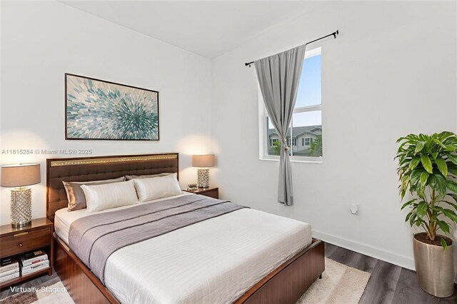 2652 SE 13th St, Homestead, FL 33035 - bedroom with dark wood finished floors and baseboards