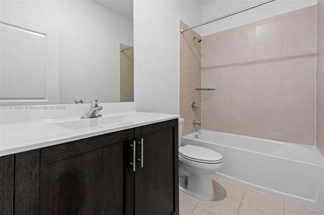 2652 SE 13th St, Homestead, FL 33035 - bathroom featuring toilet, vanity, shower / bathtub combination, and tile patterned flooring