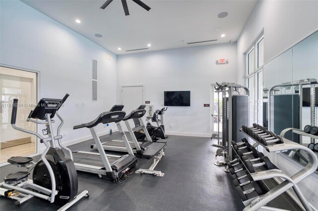 2652 SE 13th St, Homestead, FL 33035 - exercise room with a towering ceiling, ceiling fan, baseboards, and recessed lighting