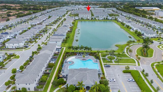 2652 SE 13th St, Homestead, FL 33035 - aerial view of residential area with a pool area and a large body of water