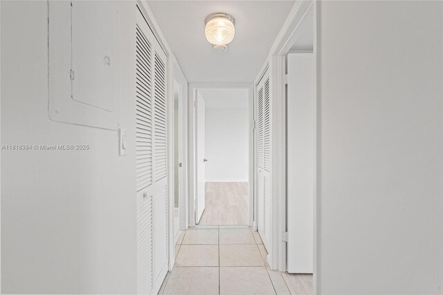 1450 Brickell Bay Dr Unit 806, Miami, FL 33131 - hallway featuring light tile patterned flooring