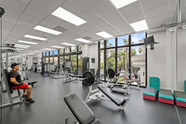 1450 Brickell Bay Dr Unit 806, Miami, FL 33131 - workout area featuring a drop ceiling and floor to ceiling windows