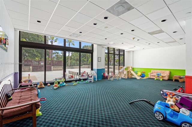 1450 Brickell Bay Dr Unit 806, Miami, FL 33131 - rec room with carpet floors and a drop ceiling