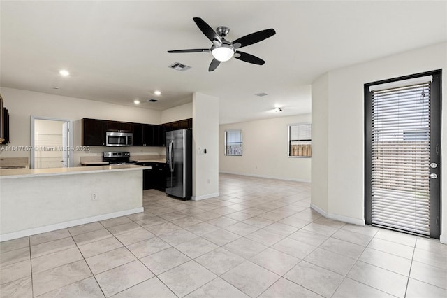 150 NE 23rd Ter, Homestead, FL 33033 - kitchen with stainless steel appliances, open floor plan, light countertops, a ceiling fan, and recessed lighting