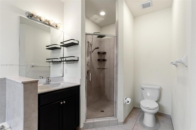 150 NE 23rd Ter, Homestead, FL 33033 - bathroom with toilet, a stall shower, vanity, and tile patterned floors