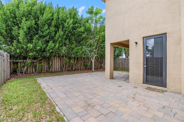 150 NE 23rd Ter, Homestead, FL 33033 - fenced backyard featuring a patio