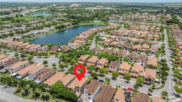 150 NE 23rd Ter, Homestead, FL 33033 - aerial view of property and surrounding area with nearby suburban area and a nearby body of water