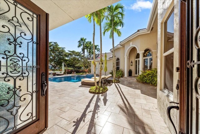 3212 NW 64th St, Boca Raton, FL 33496 - swimming pool featuring a patio area
