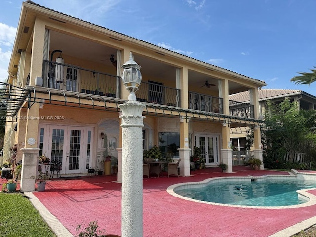 15341 SW 20th St, Miramar, FL 33027 - rear view of house featuring a balcony, french doors, a patio area, and a ceiling fan