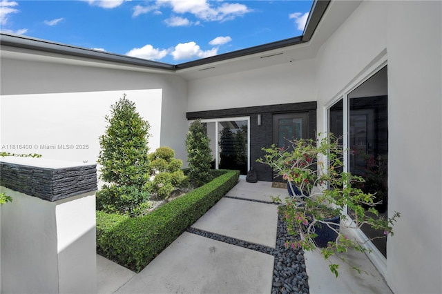 14051 SW 48th St, Miami, FL 33175 - property entrance featuring stucco siding