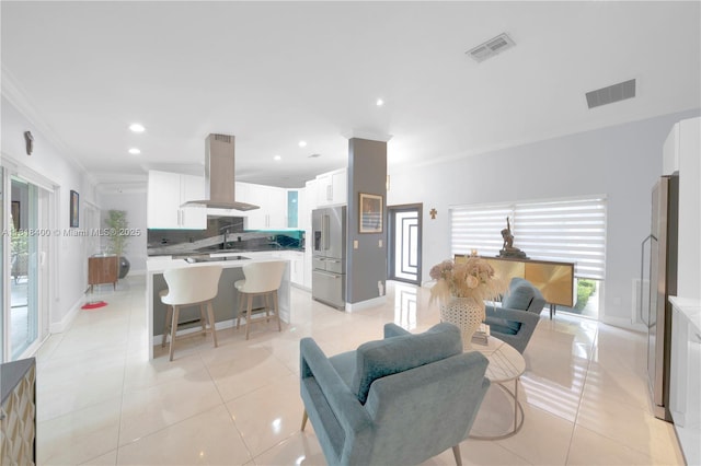 14051 SW 48th St, Miami, FL 33175 - living room featuring crown molding, recessed lighting, light tile patterned floors, and baseboards