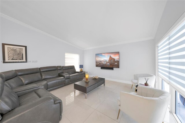 14051 SW 48th St, Miami, FL 33175 - living area with lofted ceiling, ornamental molding, baseboards, and light tile patterned floors