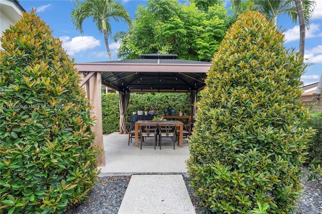 14051 SW 48th St, Miami, FL 33175 - view of patio featuring a gazebo and outdoor dining area