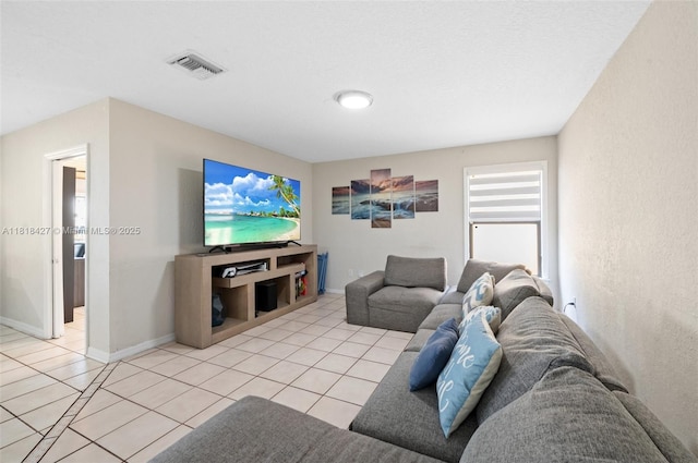 9916 SW 218th Ter, Cutler Bay, FL 33190 - living area with light tile patterned flooring and baseboards