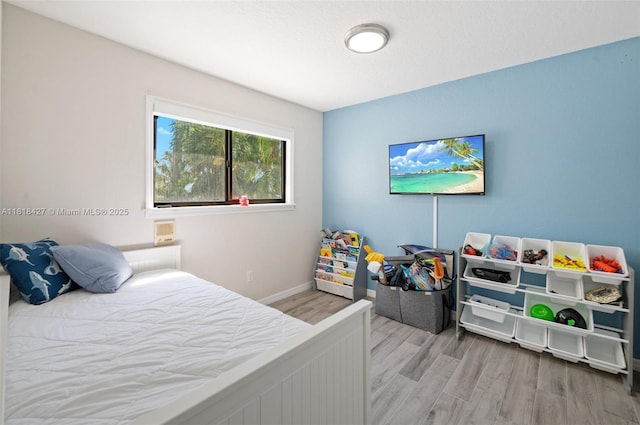 9916 SW 218th Ter, Cutler Bay, FL 33190 - bedroom with wood finished floors and baseboards