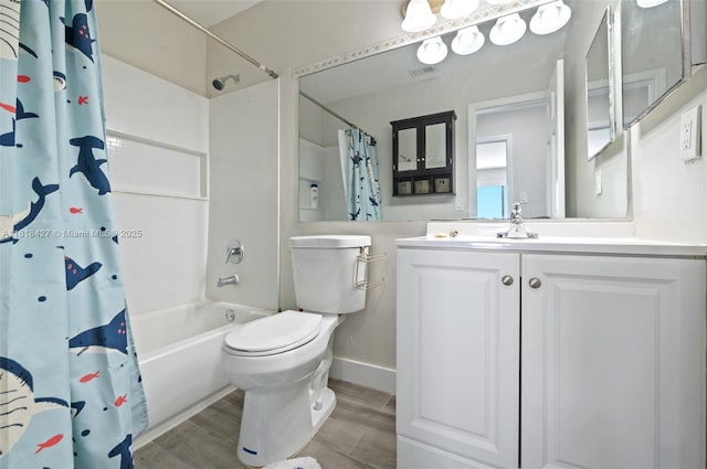 9916 SW 218th Ter, Cutler Bay, FL 33190 - full bathroom featuring toilet, shower / tub combo with curtain, wood finished floors, and vanity