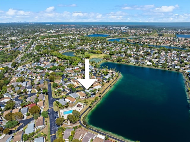 9916 SW 218th Ter, Cutler Bay, FL 33190 - aerial view of property and surrounding area featuring a large body of water and nearby suburban area