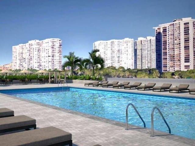 18051 Biscayne Blvd Unit 1403, Aventura, FL 33160 - community pool featuring a patio