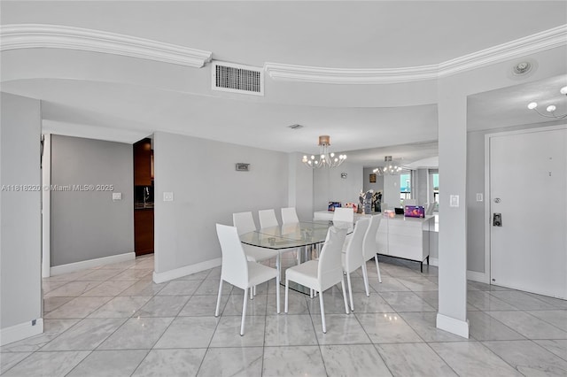 2100 S Ocean Ln Unit 703, Fort Lauderdale, FL 33316 - dining space featuring a chandelier, light marble finish floors, and crown molding