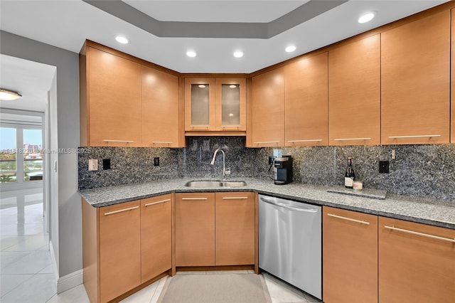 2100 S Ocean Ln Unit 703, Fort Lauderdale, FL 33316 - kitchen featuring dishwasher, dark stone counters, recessed lighting, decorative backsplash, and light tile patterned floors