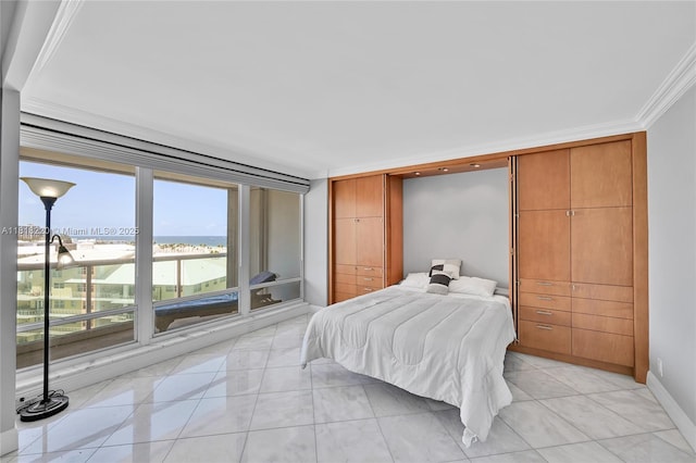 2100 S Ocean Ln Unit 703, Fort Lauderdale, FL 33316 - bedroom featuring baseboards and light tile patterned floors