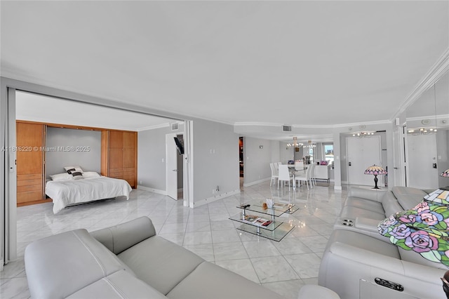 2100 S Ocean Ln Unit 703, Fort Lauderdale, FL 33316 - living area featuring ornamental molding and a chandelier