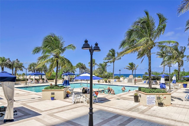 2100 S Ocean Ln Unit 703, Fort Lauderdale, FL 33316 - community pool with a patio area and a gazebo