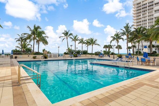 2100 S Ocean Ln Unit 703, Fort Lauderdale, FL 33316 - community pool featuring a patio area