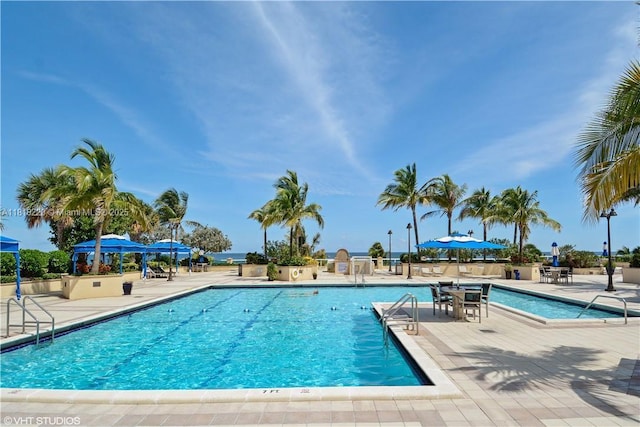2100 S Ocean Ln Unit 703, Fort Lauderdale, FL 33316 - community pool featuring a gazebo and a patio area