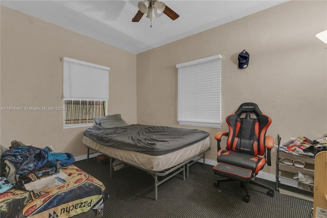 1478 NW 74th St, Miami, FL 33147 - carpeted bedroom featuring baseboards and a ceiling fan