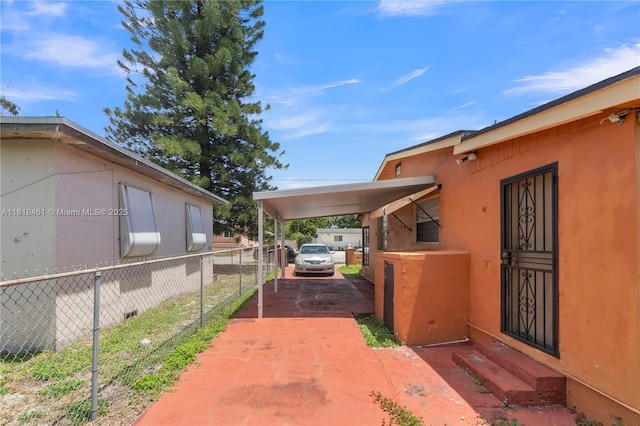 1478 NW 74th St, Miami, FL 33147 - view of parking / parking lot with a carport
