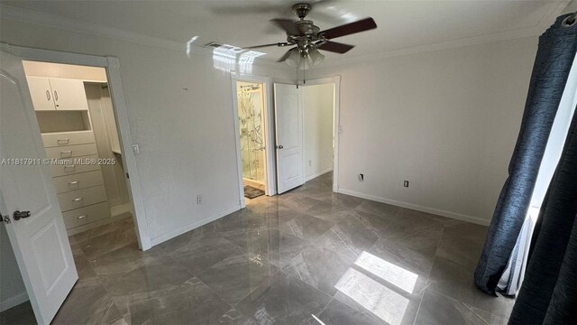 7115 SW 147th Ct, Miami, FL 33193 - unfurnished bedroom featuring crown molding, marble finish flooring, ensuite bathroom, and ceiling fan