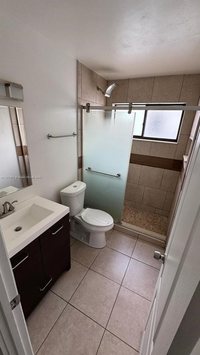 7115 SW 147th Ct, Miami, FL 33193 - bathroom with vanity, a stall shower, and tile patterned flooring